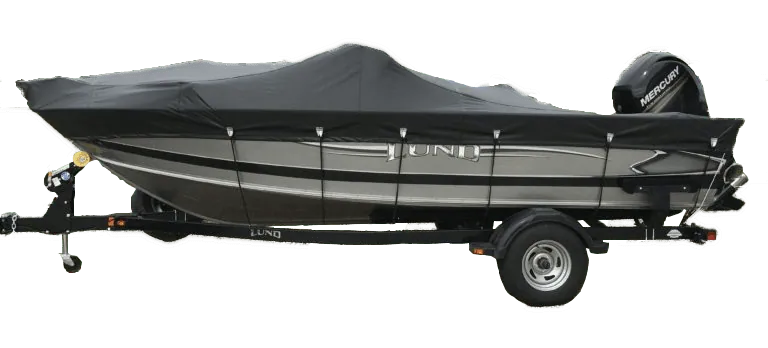 Fishing boat on a trailer under a fitted black Tarp Pro boat cover